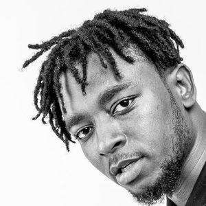 Magnom – I Dey Hustle Ft Caine